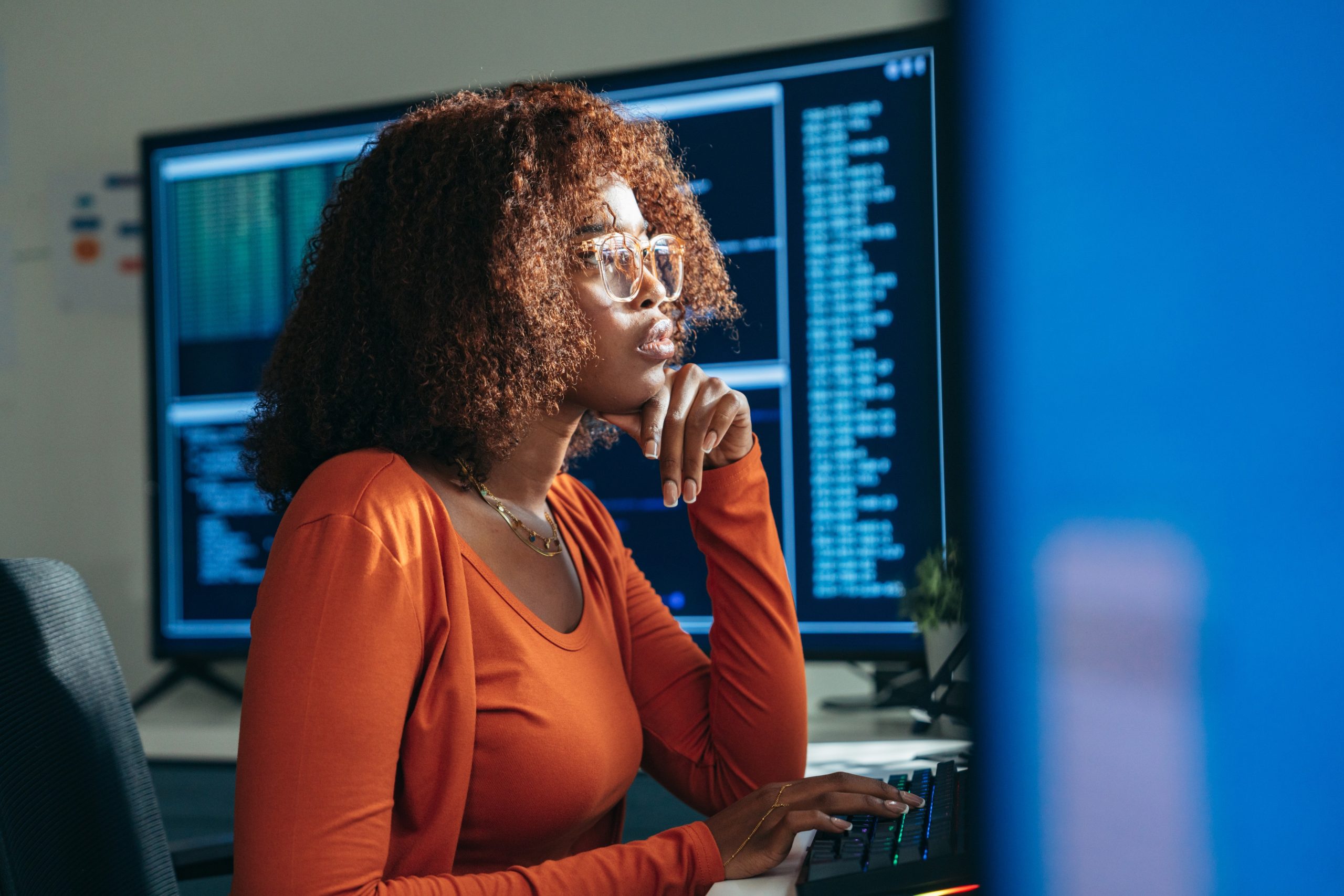 Woman working at computer screen